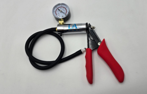 Complete L.A. Pump Deluxe Chrome Vacuum Pump featuring a chrome-plated barrel, comfort grip handles, vacuum gauge, and premium hose assembly.