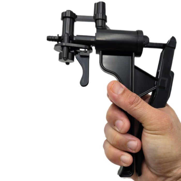 Image of the Bath Pump with a hand squeezing the trigger.