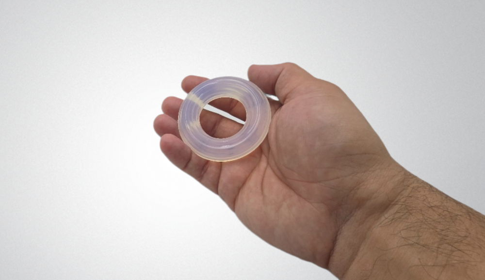 Frosted Silicone Restriction Ring shown in hand for size reference