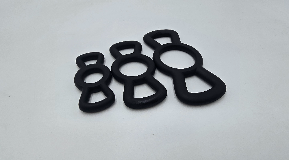 Winged silicone restriction rings shown in small, medium, and large sizes