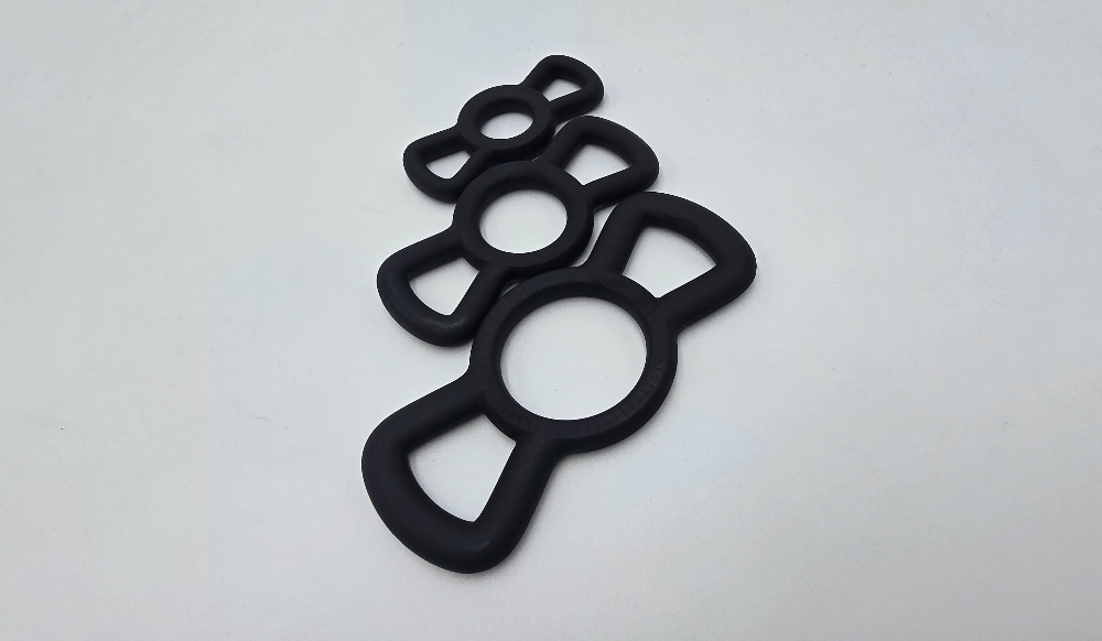 Winged silicone restriction rings shown in small, medium, and large sizes